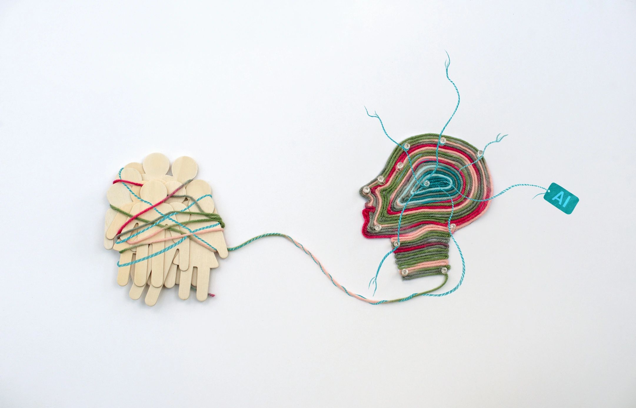 Humanity bound together and manipulated by an artificial intelligence mind. Conceptual art showing people controlled by AI.